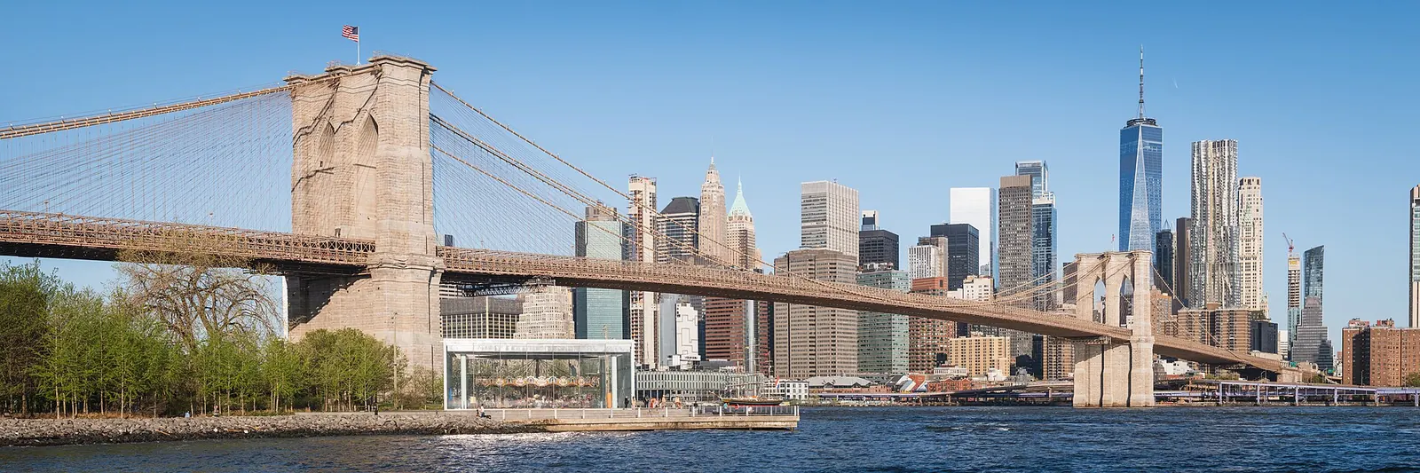 Brooklyn Bridge and the Lower Manhattan skyline from Pebble Beach, New York — New York